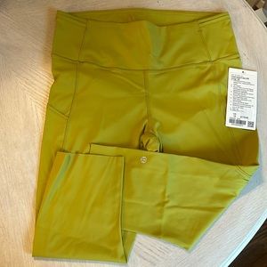 Lululemon fast and free, 19” NWT with side pockets size 12